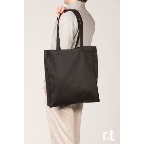 Mulepose med lang hank, side og bund fals. 